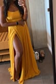 I brought this dress for a wedding in Michigan. I absolutely loved it. It does run a little long so I paired them with wedges. It fits perfectly. I do wear a size 36C bra and I decided to not wear a bra that night which didn't seem to be an issue. The only thing I would change is maybe to get it in a small so that the bust wouldn't have been as loose as it came out to be. - Samrana B.