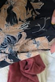 I wanted this dress to work so bad! I wore this to a wedding and on the night of, the dress ripped right along the seam. I really did LOVE the look of it but unfortunately, the material was not as sturdy as I like it to be. - Joy M.