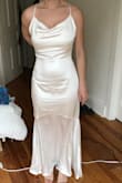 Material was slightly wrinkly. You get what you pay for. Bottom layer is thinner than the top layer. Love the cowl neck and flattering open back. - Susana T.