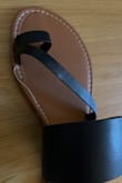 I got these in tan and loved them, so I decided to get them in black as well. However, they were shipped to me with the thread partially undone. - Kim G.