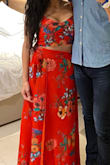 This looks so gorgeous on.  The skirt shows just enough leg to be subtle and sexy when you walk or if it's breezy outside.  I even swapped out the crop top and wore the skirt with a bodysuit for a casual dinner and it was perfect.

It's super long though!  I'm 5'1 and wore 4-inch heels and I still had to get it hemmed about 3-4 inches. - Kristy G.