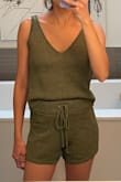 I love this set and I'm glad I got it! After reading reviews I went with the XS which is my usual size and I'm happy with it, it fits well!
I disagree with the other reviews that say it's too itchy or uncomfortable. Ya, it's not buttery soft since it's made out of nylon/acrylic, but it's still comfy enough for day to day and to sleep. I can totally see wearing this top out with jeans too!
For reference the shorts are right at my belly button so the top falls just below it, it's cropped so if you want it a tad longer, go up a size. - Marilia B.