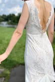 This was a perfect wedding dress for me! I originally ordered a small, which was way too big on me and reordered an extra small which was still too big. I ended up getting it altered for the extra small to fit correctly. I found the dress to be comfortable. I will note that my train easily picked up leaves and debris, so keep that in mind! - Madeline P.