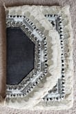 This clutch is absolutely beautiful!!! The quality is amazing and it can be worn with so much! I'm debating on if I should get the other colors. You'll definitely get compliments on this....can't wait to use it!!! - Chenille B.