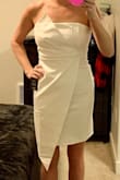 Fit is great, material has a nice stretch, and the asymmetrical cut is beautiful on. I hope they add more colors in this! - Jill H.