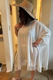 I love this beach cover-up! It's super cute, flowy, and comfortable. I love the crocheted tassels, it gives it a fun, bohemian look. Can't wait to wear it to my trip to Mexico! - Jenna A.