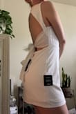 So beautiful! I sized up and got an XL instead of a L that's why I said this dress runs small is because I knew it would be too short if I didn't. This dress is so flattering and the back is breathtaking. - Emily J.