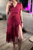 The slit hits in the perfect spot and the dress fit perfectly in all places! Hugged my waist perfectly. Loved the color of the red, it's a deeper red, not a bright and not quite maroon. - Mary B.