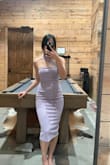 I loved this dress! I'm usually a S, but I ordered an XS bc I was worried about the length. It was really tight, but it was bearable lol. It was a bit longer than I wanted, but it was still a beautiful dress! It's made of a nice thick material that's a beautiful color. My only problem was that since it was super tight my underwear kept bunching up and you could see the bunching lol. No matter what I did I could not smooth my panty out, so I just went commando, Problem solved lol. - Sarah P.