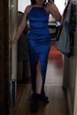 The material of this dress, the quality, A+! It's gorgeous, simple but so stylish. I love how comfortable it is. I originally bought it for a college graduation but I feel like it doesn't fit the occasion so sadly will be returning it :(
It was a bit long on me so if you're 5'3 you may have to get it altered unless you wear shoes that are tall enough. The straps are stretchy and adjustable so that's really comfortable as well, nothing felt like it was digging in! I could literally fall asleep in this dress that's how comfy it felt. The dress is lined so it feels nice and thick, I find satin dresses can sometimes be really thin but this one isn't! The color in the photos is accurate mine just looks a bit dark cause I was in a hallway. It's very simple but can easily be glammed up or paired with minimal jewelry for a sleek look. - Sara P.