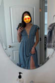 Runs a little bit big- I am usually a 4 in dresses and this XS fit me great! The chest is a little loose but clothing tape did the trick! Such a beautiful, flattering dress and comfortable too! - Christina B.