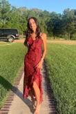The dress was stunning! I wore it to prom, and I got compliments from everyone. It was a little bit looser than I expected, but I wouldn't change my size. One downside is that although the left strap is adjustable, the right one isn't so you might have to get it fixed up. Otherwise, beautiful dress:) - Elizabeth D.