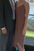 This dress was perfect for a simi formal wedding! It ran a little bit small so I ordered a size up and it fit comfortably. - Mollie N.