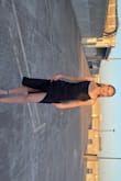 The material of this dress was way better than I expected. The waist fits me perfectly, but under the armpits was too big. I just used safety pins since I didn't have time to get it altered. The ruching was super flattering over the stomach. - Hannah G.