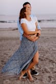 Super comfy, nice, and long. I should have ordered a small, but the tie helped it tighten a little. I was worried about it coming up too short, but I think a small would have hit alright at my ankles. Wore this for my engagement photos and it was perfect. - Clarissa S.