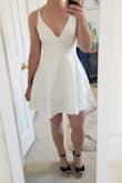 I'm usually a small for Lulus dresses but after reading reviews sized up to medium and it fits perfectly. My only complaint is that the skirt falls kind of weirdly making it stick out on the sides but I think that's because the fabric is so thick and probably needs to be steamed. - Kathryn M.