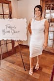 This dress was exactly what I wanted for my bridal shower. It was the right amount of sexy with the open back but kept it classy with the high neck and the longer length. It was also the perfect length for sitting and opening gifts and not showing everyone the goods. - Fallyn K.