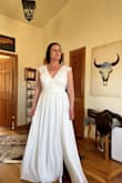 I loved the way this looked on me all except this dress was not a good fit for me. The zipper would not zip all the way due to my ribs being to big. Debating trying a larger size, but I am worried the chest would be to big for me, - Caitlin H.