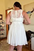 I love the bottom of the dress and could imagine two stepping around in it. But the lace on the top I found uncomfortable. Also, I got a medium, in ALL of the dresses I found on here I tried in a medium and while that is recommended for me, I am clearly more a large. - Caitlin H.