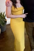 I wore this to a rehearsal dinner and it is very pretty. I wore Spanx with it to keep my stomach tight. It does run a little large, I originally ordered a medium, but returned it for a small. - Ariel M.