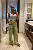 I'm 5'3 and I didn't have to hem them. Slightly see through but worked perfectly with a thong bodysuit - Lauren L.