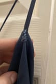 The strap broke when I was trying it on!! I ended up keeping it and fixing the strap myself and then reinforcing the other strap. Will be wearing it to a wedding in a few weeks. - Laura M.