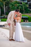 I purchased this dress (and 5 other Lulus styles!) hoping one would be perfect for my wedding in Antigua. I loved most of the styles but this one was the perfect choice! I had it hemmed because I'm so short and was barefoot on the beach for the ceremony but other than that, this dress fits true to size. I have a short torso so the straps were a little loose but not so much that they needed altering. The beading is GORGEOUS and looks very high quality and ornate. The sheer mesh cutouts and v-neck offer a little bit of sexy yet elegant. LOVED IT! - Emily M.