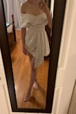 This dress is beautiful and has really nice material. Color is more ivory vs pictures posted but still really nice - Olga Z.