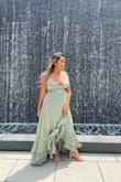 The dress was beautiful. I loved it. It was just a little tight from the chest area which made the strings undo. I had to keep pulling the top part up. But other than that I loved it. - Khushabu R.