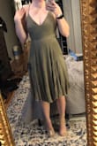 The dress fits a little tighter than I would have thought. Honestly had a little trouble shimmying it over my hips/shoulder when trying to get it on but once it's in place it fits really nice. Hits right at/below my knees, wish it was slightly longer. But otherwise great quality - Kyleigh D.