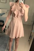 I wanted to love this dress and I do think it's super cute. It just wasn't long enough for me. The rest of the dress fit me perfectly. It is just extremely short. Even wearing flats I couldn't get away with it so forget trying to wear heels with it. Any tiny movement and I would have been flashing everyone. I would only recommend this if you're a short girl maybe 5'5 and under. Anyone taller and this will fit more like a long shirt than a dress! Really wish lulus would make more of their dresses in a tall length so us taller girls could still get a dress that fits in the body but is long enough to wear with heels. Ugh! See photos for fit on me. - Lizzy M.