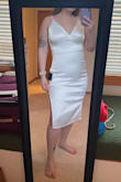 This is a super cute dress, but I went with something else. It's super comfortable & has a little stretch in the satin part. The top was a little big for me so I had to have the straps pretty tight. (I'm wearing Spanx that are too high in the second pic, so ignore the opaque line on my back) - Megan C.