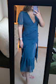 I had no idea how the hem of this dress looked from the pictures & thought I got a botched dress. It has potential on the right person, but I couldn't get over it. The top was extremely loose on me also. - Megan C.