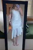 This dress looks great on some people, but I'm not one of them. It just looked like a nightgown on me with the extra fabric on my hips. The dress itself is beautiful, but it's not for my body. - Megan C.