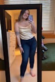 I couldn't get this to look quite right on me but it is a super cute top! The material is a little stretchy. - Megan C.