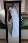 I would've had to wear heels or get this dress hemmed as it is very long. It's a very cute dress but it just overpowered me, unfortunately! I also should probably have been in a large, so this is a little tight on me! - Megan C.