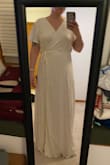I think the dress felt secure enough, it just was a little too simple for me. On the right person, this would be a really cute dress! I liked the wrap & the little sleeves. - Megan C.
