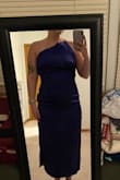 This dress fit so weird on me. The back is very cool, but the front is horrendous on me. I had to have it tied super tight to be able to cover myself and then it didn't lay flat. - Megan C.