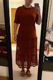 I wish the neck on this was a little tighter like a mock neck. It was a little loose on me & made the overall look off. I loved the color & design of the dress itself! - Megan C.