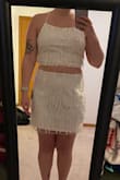 This set was somehow too big and too small on me at the same time. It's so cute on people who fill it out right but that wasn't me. It ends up kind of looking like a paper bag on my body. It has a really cute back on the top! I think the top fit me better than the skirt. - Megan C.
