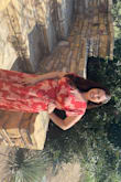 The dress has a beautiful print with the color contrast. Received compliments on it. I'm between a Large and XL. The XL would've been too big. It is long from the bottom and should be hemmed. - Nancy E.