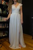 I liked the dress but I ordered an XS when I should have ordered a small. So if it was the right size I would have liked it more, but I also felt like it wasn't quite my style. It was cute though, and definitely think it would look great on the right person! - Emily C.