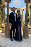This dress is so gorgeous! The slits are high, but the tulle laid overtop makes them super chic and classy. I wore this dress to a black-tie wedding and I got SO MANY COMPLIMENTS!!! 

It is rather long, but I'm pretty tall and had on 2-3" heels. - Sarah V.