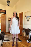 I originally was planning a courthouse wedding and then heading out to go country dancing at a local ranch and next year we would do a big thing. That has since changed and we are now doing a microwedding this year. That is the only reason I did not keep this dress. It would make a great dress to go two stepping in! the cut is flattering to individuals built like me!
Ignore the goofy face and unflattering picture angle LOL - Caitlin H.