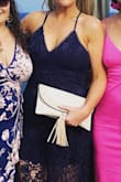 I needed a clutch for vacation that went with everything and this was it! - Bailey