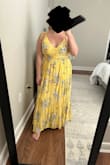 There were no reviews when I bought this dress so I had no clue that I would hate the fit. You can't necessarily tell from the picture but the skirt has SO much fabric. The material is lightweight but with all that fabric it felt heavy on my body. I typically wear a L/XL in Lulus and this runs a little large. The straps on the shoulders are adjustable as well as the tie that wraps around to the back so you can pull it tighter around your waist. I love most dresses that tie around the waist but this dress overall just made me feel frumpy. I returned. - Amanda A.
