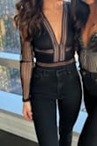 I love this top. The lace on the arms is slightly big but it doesn't look bad. The body part fits perfectly and was just tight enough around the bust to give the boobs some support (open back so can't wear a bra). Got so many compliments! - Kelsey K.