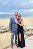I wore this dress for a beach wedding in Mexico and dressed it up with bright jewelry.  I got SO MANY compliments.  The low neck line and slit are flattering but still conservative enough overall. - Danielle S.