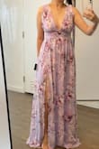 Wore to a wedding in Mexico in March. The color and pattern were perfect. Got many compliments - including from the bride herself! (She said she may order the same thing for her sister's wedding!)
I usually wear M for other stores but almost always a S for Lulus. It was a little tight around the waist but breathable. Definitely long, even with heels. I didn't have time to get it hemmed and the fashion tape didn't work well with the fabric, but it looked fine with me holding it throughout the dancing. - Elizabeth K.