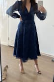 Wore this to a semi-formal February wedding in NYC. Loved the long sleeves and the flow of the dress! I just wish it was a little shorter in length. It came down a little too long on my legs.
(I ended up wearing the black heels with this dress). - Elizabeth K.